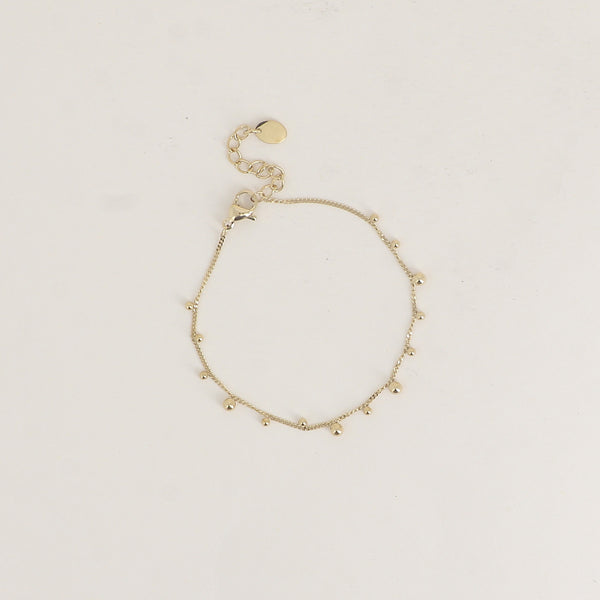 fijn goudkleurig armbandje met bolletjes | stainless steel