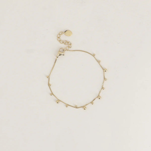 goudkleurig armbandje met ronde bolletjes | stainless steel