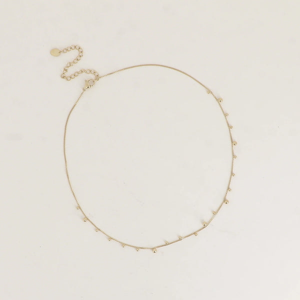 fijn goudkleurig collier met bolletjes | stainless steel