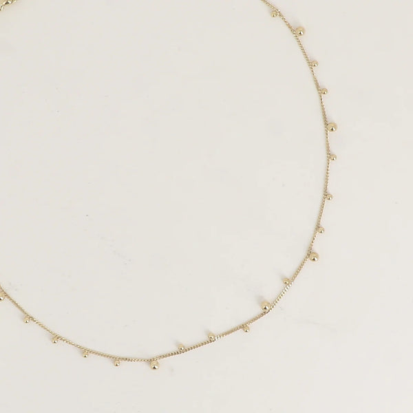 fijn goudkleurig collier met bolletjes | stainless steel
