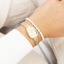 Afbeelding in Gallery-weergave laden, eivormig goudkleurig oozoo horloge met goudkleurige wijzerplaat
