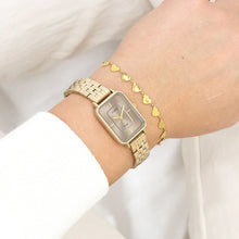 Afbeelding in Gallery-weergave laden, goudkleurig rechthoekig horloge met taupe wijzerplaat en grove schakelband | oozoo
