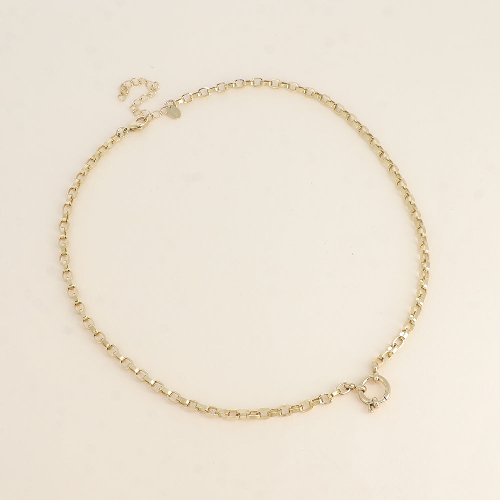 goudkleurig schakelcollier met groot slot stainless steel