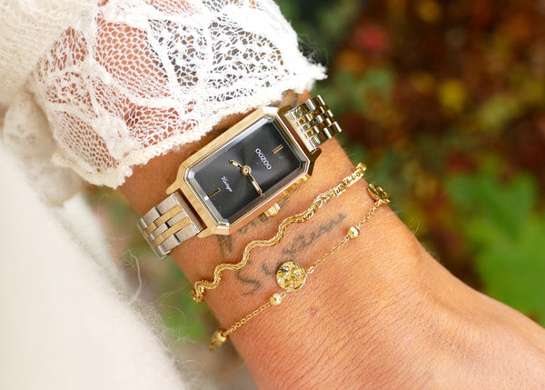 fijne goudkleurige armband met gehamerde muntjes stainless steel