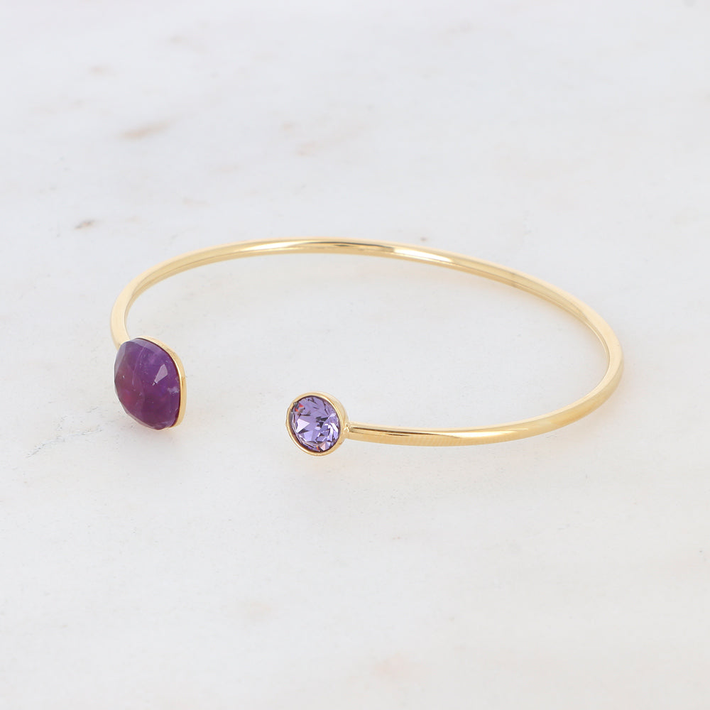 goudkleurige bangle met paars en bordeaux gekleurde stenen | stainless steel