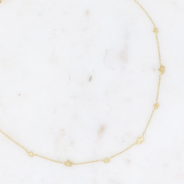 goudkleurig fijn kettinkje met ginkgo blaadjes | stainless steel