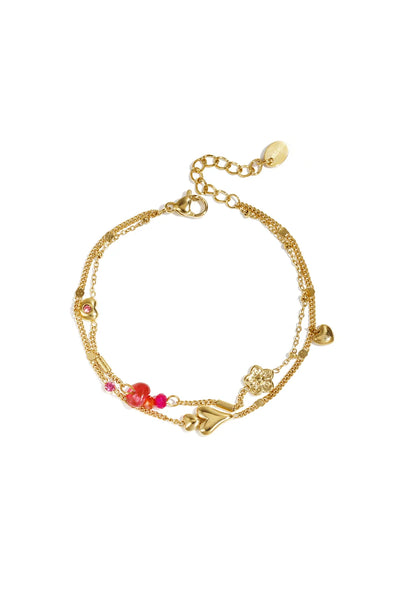 goudkleurig dubbel armbandje met roze accenten | stainless steel